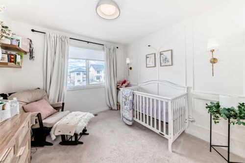 3 Agate, Cochrane, AB - Indoor Photo Showing Bedroom