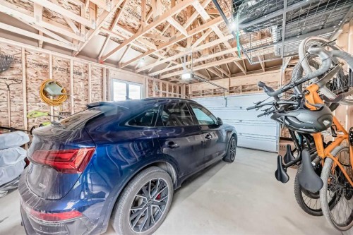 3 Agate, Cochrane, AB - Indoor Photo Showing Garage