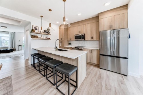 3 Agate, Cochrane, AB - Indoor Photo Showing Kitchen With Upgraded Kitchen