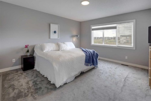 154 Amblehurst Way Nw, Calgary, AB - Indoor Photo Showing Bedroom
