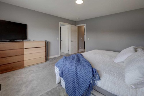 154 Amblehurst Way Nw, Calgary, AB - Indoor Photo Showing Bedroom