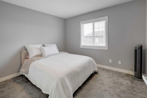 154 Amblehurst Way Nw, Calgary, AB - Indoor Photo Showing Bedroom