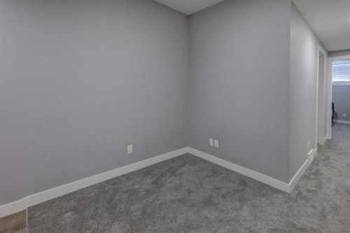 154 Amblehurst Way Nw, Calgary, AB - Indoor Photo Showing Other Room