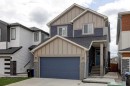 154 Amblehurst Way Nw, Calgary, AB  - Outdoor With Facade 