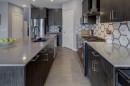 154 Amblehurst Way Nw, Calgary, AB  - Indoor Photo Showing Kitchen With Double Sink With Upgraded Kitchen 