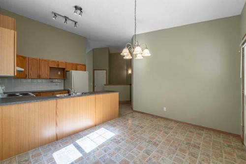 44 Prestwick Pond Terrace Se, Calgary, AB - Indoor Photo Showing Kitchen With Double Sink