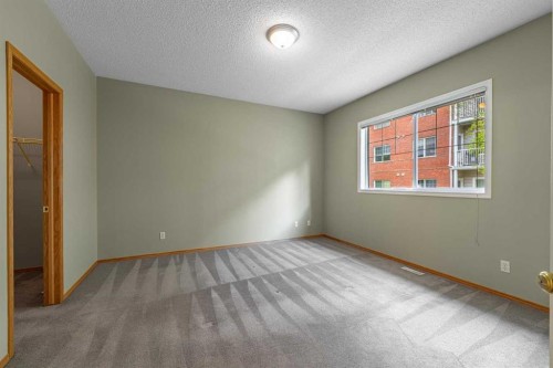 44 Prestwick Pond Terrace Se, Calgary, AB - Indoor Photo Showing Other Room
