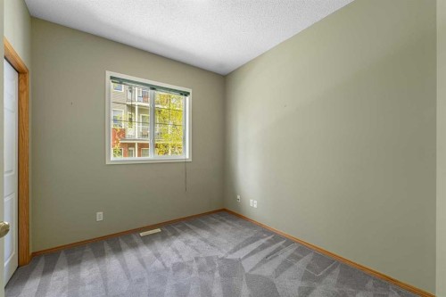 44 Prestwick Pond Terrace Se, Calgary, AB - Indoor Photo Showing Other Room