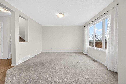 99 Buckskin Way, Cochrane, AB - Indoor Photo Showing Kitchen With Upgraded Kitchen