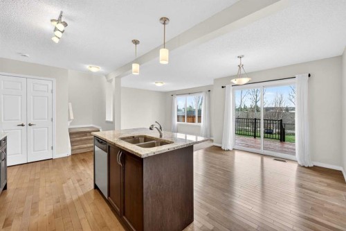 99 Buckskin Way, Cochrane, AB - Indoor Photo Showing Kitchen With Double Sink