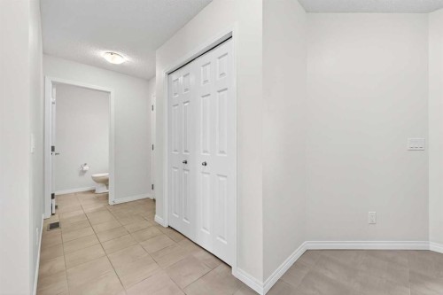 99 Buckskin Way, Cochrane, AB - Indoor Photo Showing Other Room