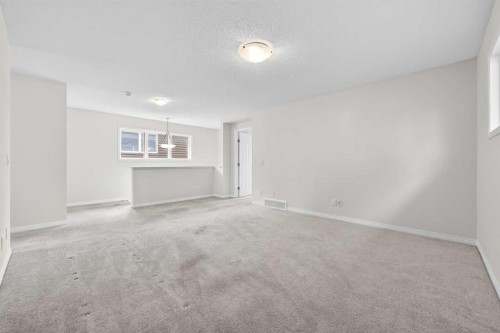 99 Buckskin Way, Cochrane, AB - Indoor Photo Showing Other Room