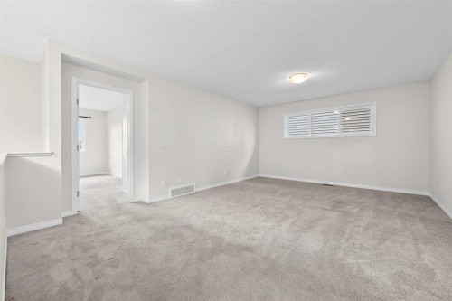 99 Buckskin Way, Cochrane, AB - Indoor Photo Showing Other Room
