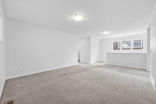 99 Buckskin Way, Cochrane, AB - Indoor Photo Showing Other Room