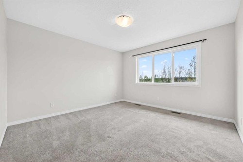 99 Buckskin Way, Cochrane, AB - Indoor Photo Showing Other Room