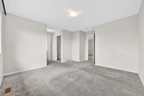 99 Buckskin Way, Cochrane, AB - Indoor Photo Showing Other Room