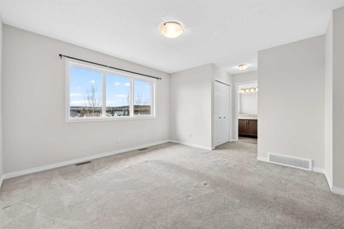 99 Buckskin Way, Cochrane, AB - Indoor Photo Showing Other Room