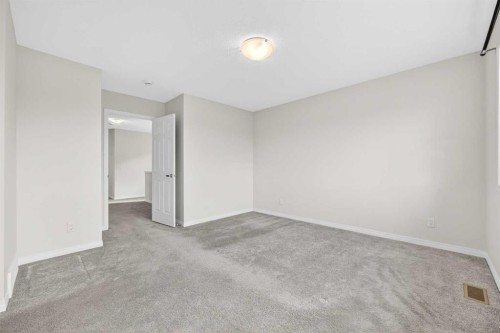 99 Buckskin Way, Cochrane, AB - Indoor Photo Showing Other Room