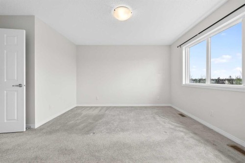 99 Buckskin Way, Cochrane, AB - Indoor Photo Showing Other Room
