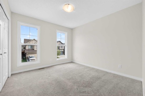 99 Buckskin Way, Cochrane, AB - Indoor Photo Showing Other Room