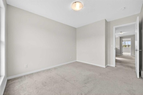99 Buckskin Way, Cochrane, AB - Indoor Photo Showing Other Room