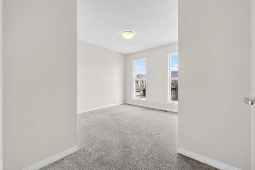99 Buckskin Way, Cochrane, AB - Indoor Photo Showing Other Room