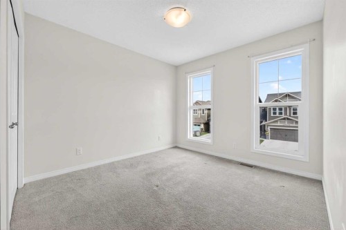 99 Buckskin Way, Cochrane, AB - Indoor Photo Showing Other Room