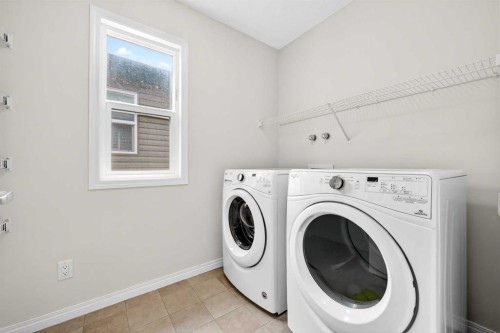 99 Buckskin Way, Cochrane, AB - Indoor Photo Showing Laundry Room