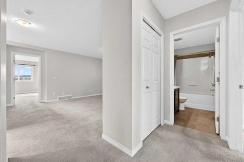 99 Buckskin Way, Cochrane, AB - Indoor Photo Showing Other Room