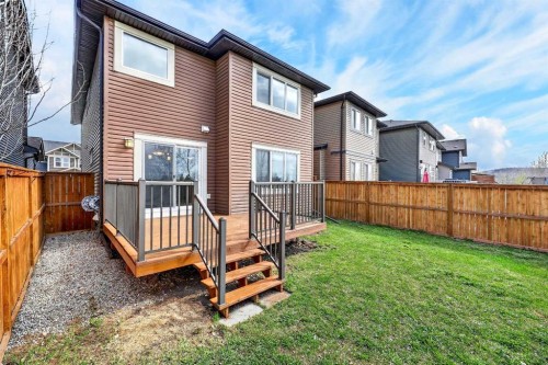 99 Buckskin Way, Cochrane, AB - Outdoor With Deck Patio Veranda