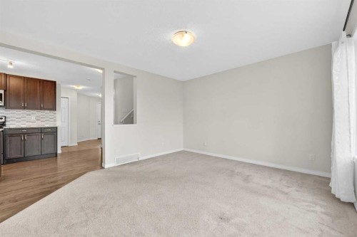 99 Buckskin Way, Cochrane, AB - Indoor Photo Showing Other Room