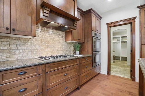 149 Aspen Glen Place Sw, Calgary, AB - Indoor Photo Showing Kitchen With Upgraded Kitchen