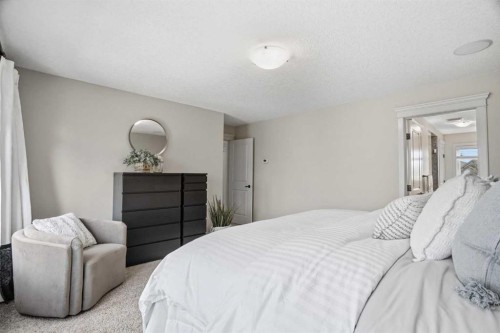 149 Aspen Glen Place Sw, Calgary, AB - Indoor Photo Showing Bedroom
