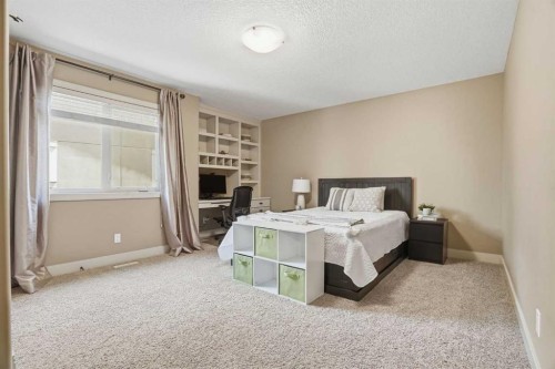 149 Aspen Glen Place Sw, Calgary, AB - Indoor Photo Showing Bedroom