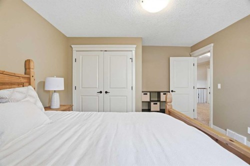 149 Aspen Glen Place Sw, Calgary, AB - Indoor Photo Showing Bedroom