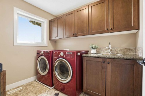 149 Aspen Glen Place Sw, Calgary, AB - Indoor Photo Showing Laundry Room