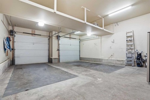 149 Aspen Glen Place Sw, Calgary, AB - Indoor Photo Showing Garage