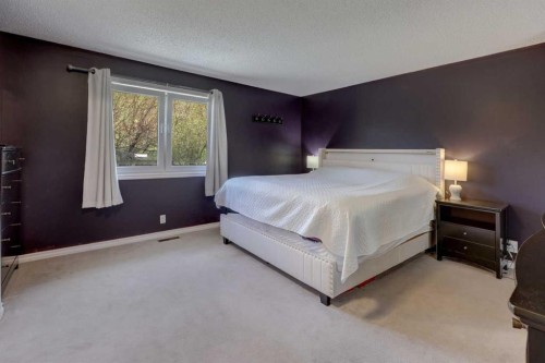 36 Hawksley Crescent Nw, Calgary, AB - Indoor Photo Showing Bedroom
