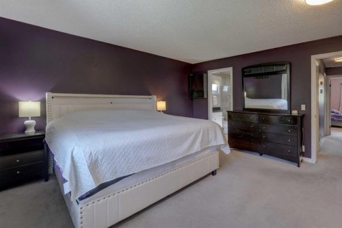 36 Hawksley Crescent Nw, Calgary, AB - Indoor Photo Showing Bedroom