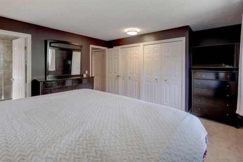 36 Hawksley Crescent Nw, Calgary, AB - Indoor Photo Showing Bedroom