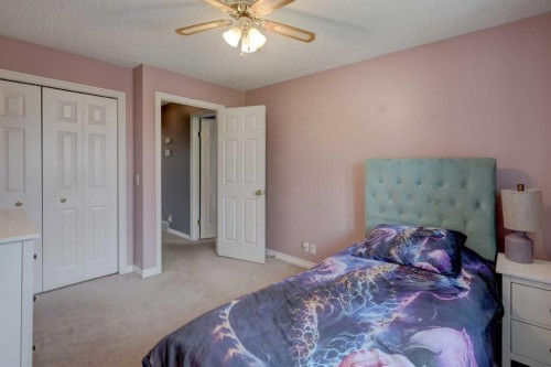 36 Hawksley Crescent Nw, Calgary, AB - Indoor Photo Showing Bedroom