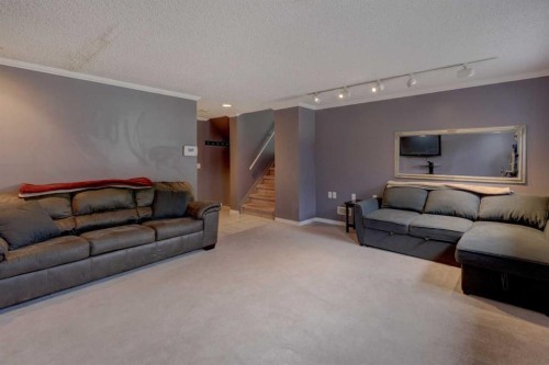 36 Hawksley Crescent Nw, Calgary, AB - Indoor Photo Showing Living Room