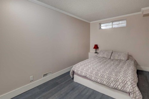 36 Hawksley Crescent Nw, Calgary, AB - Indoor Photo Showing Bedroom
