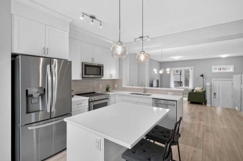 242 Livingston Common Ne, Calgary, AB - Indoor Photo Showing Kitchen With Stainless Steel Kitchen With Upgraded Kitchen
