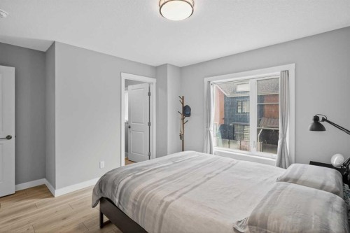 242 Livingston Common Ne, Calgary, AB - Indoor Photo Showing Bedroom