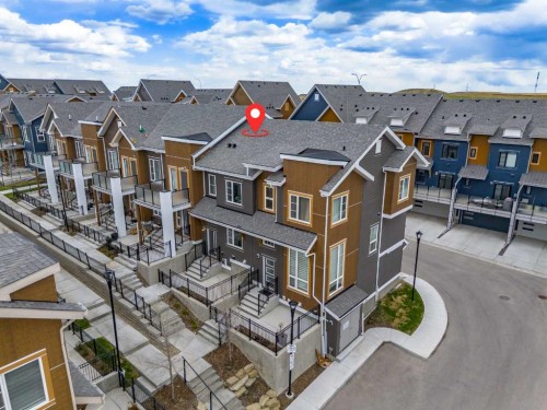242 Livingston Common Ne, Calgary, AB - Outdoor With Facade