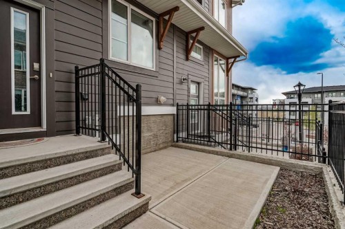 242 Livingston Common Ne, Calgary, AB - Outdoor With Exterior
