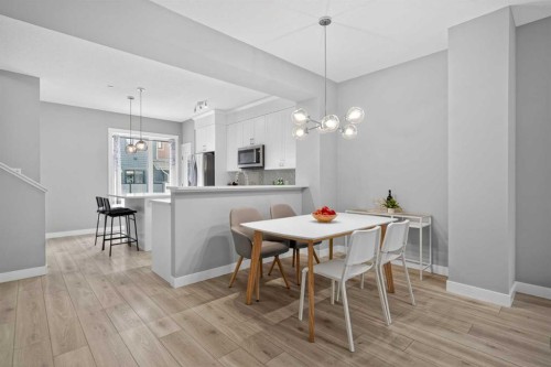 242 Livingston Common Ne, Calgary, AB - Indoor Photo Showing Dining Room