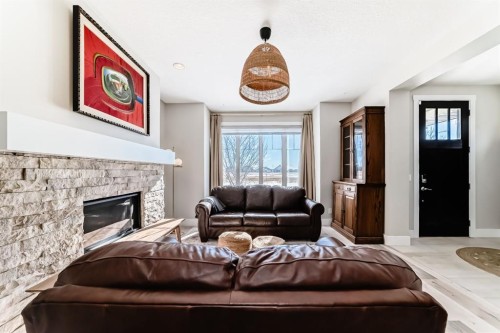 68 Mahogany Gardens Se, Calgary, AB - Indoor Photo Showing Living Room With Fireplace