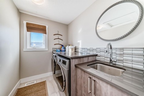 68 Mahogany Gardens Se, Calgary, AB - Indoor Photo Showing Laundry Room